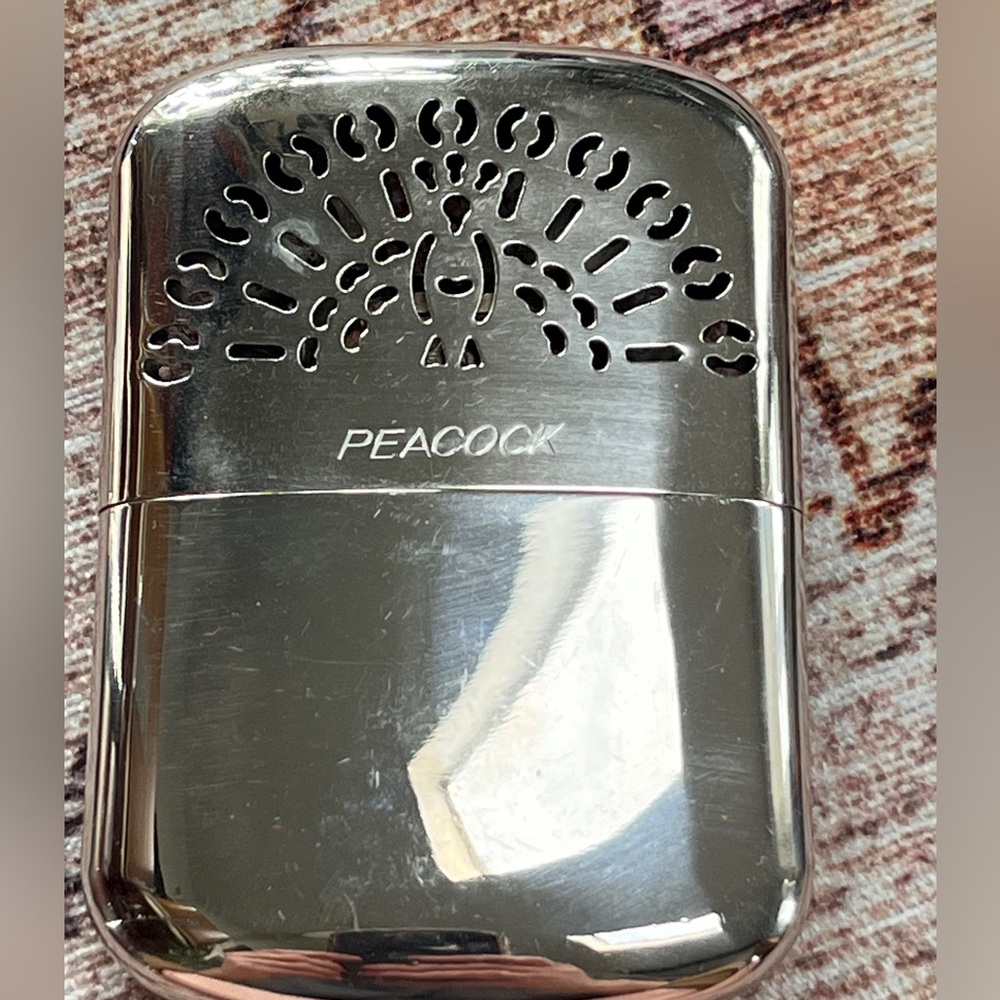 PEACOCK hand warmer